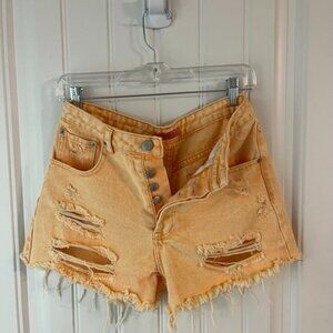 small, light orange, jean shorts